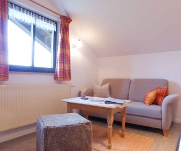 Wohnzimmer Ferienwohnung Daumen